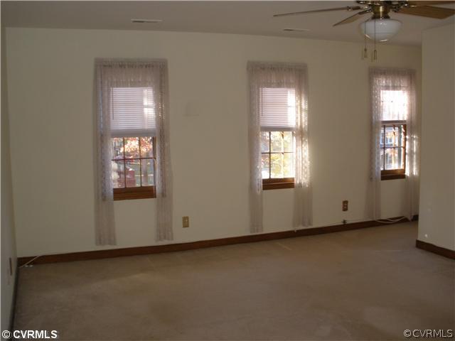 10751 Timberun Road Chesterfield, VA 23832 - Photo 7 of 10 an empty room with windows