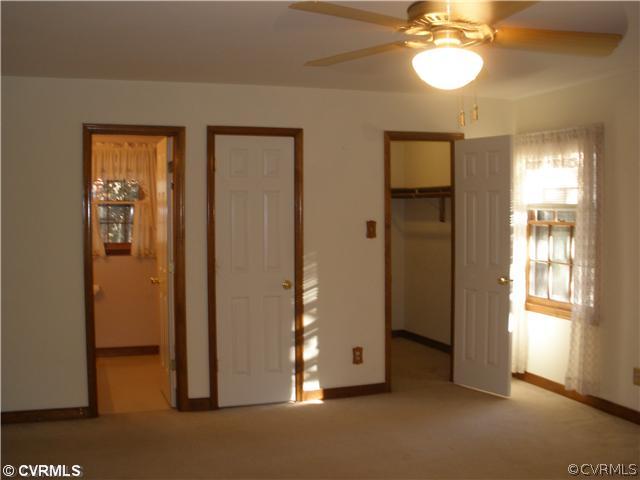 10751 Timberun Road Chesterfield, VA 23832 - Photo 8 of 10 a view of an empty room with a window
