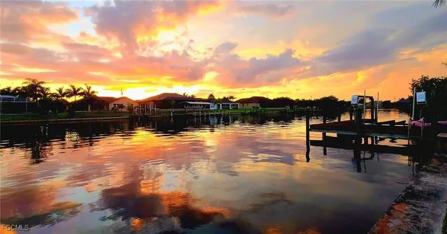 a view of a lake with sitting area