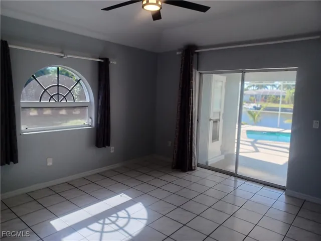 a view of an empty room and window