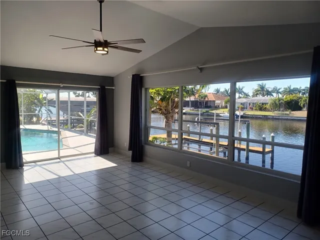 a view of an empty room and window