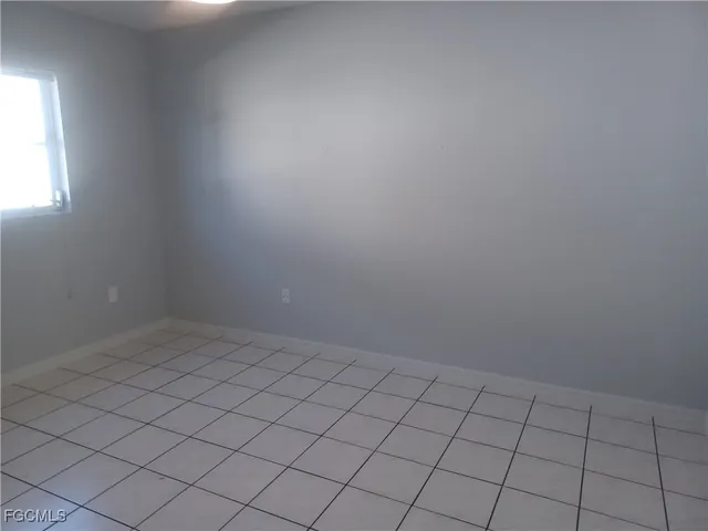 a view of an empty room with window