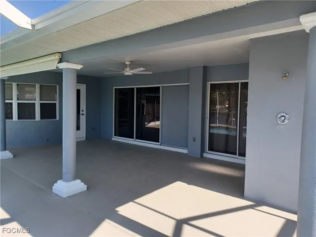 a bathroom with a sink and a window