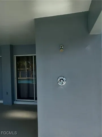 a swimming pool with outdoor seating and yard