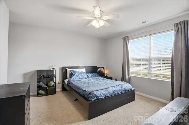 a view of a workspace with furniture