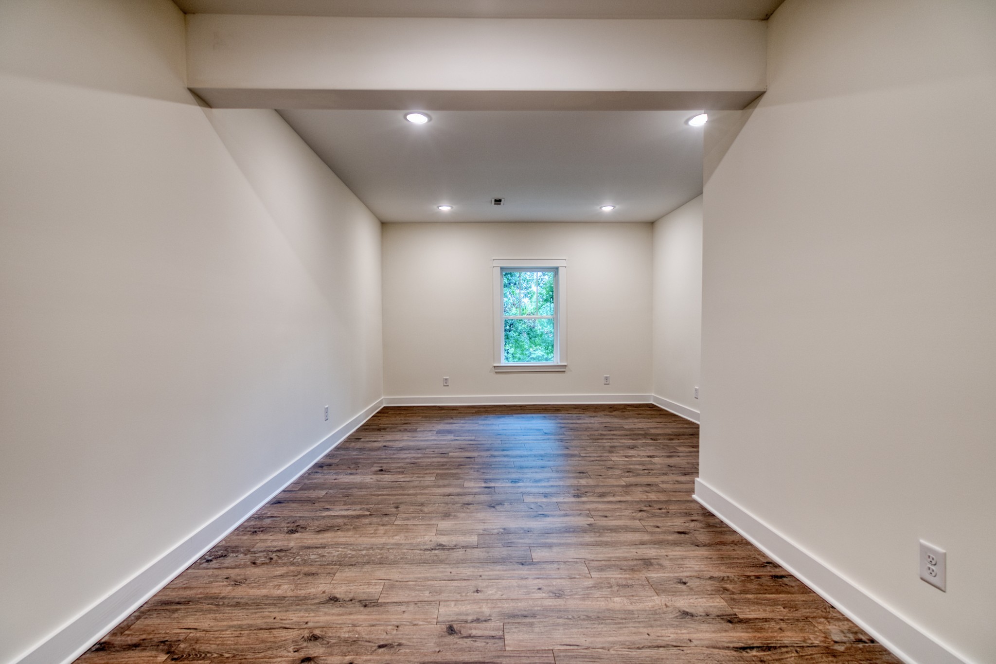 793 Spring Circle Springfield, TN 37172 - Photo 20 of 83 an empty room with wooden floor and windows