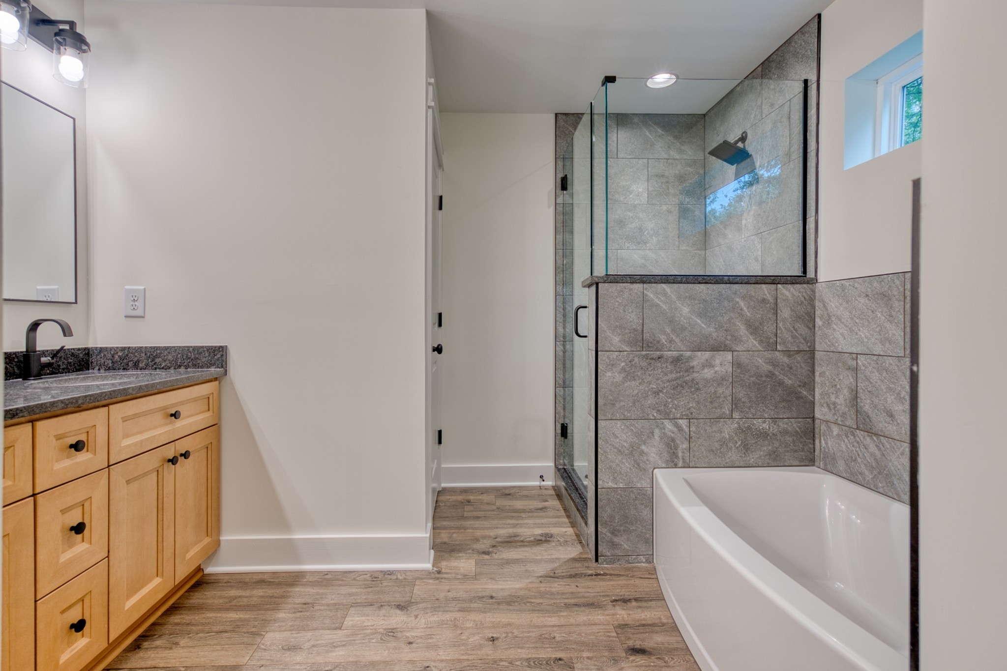793 Spring Circle Springfield, TN 37172 - Photo 25 of 83 a bathroom with a tub sink and mirror