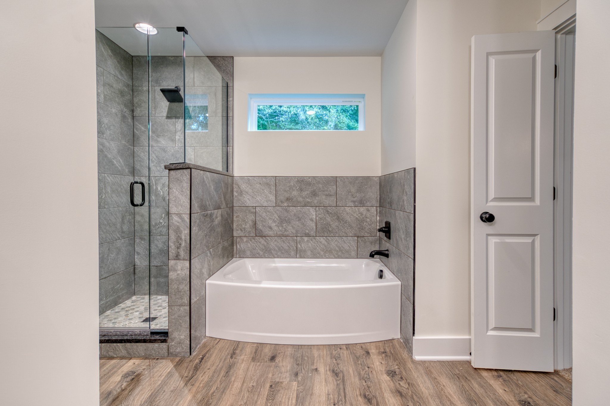 793 Spring Circle Springfield, TN 37172 - Photo 30 of 83 a bathroom with a tub and shower