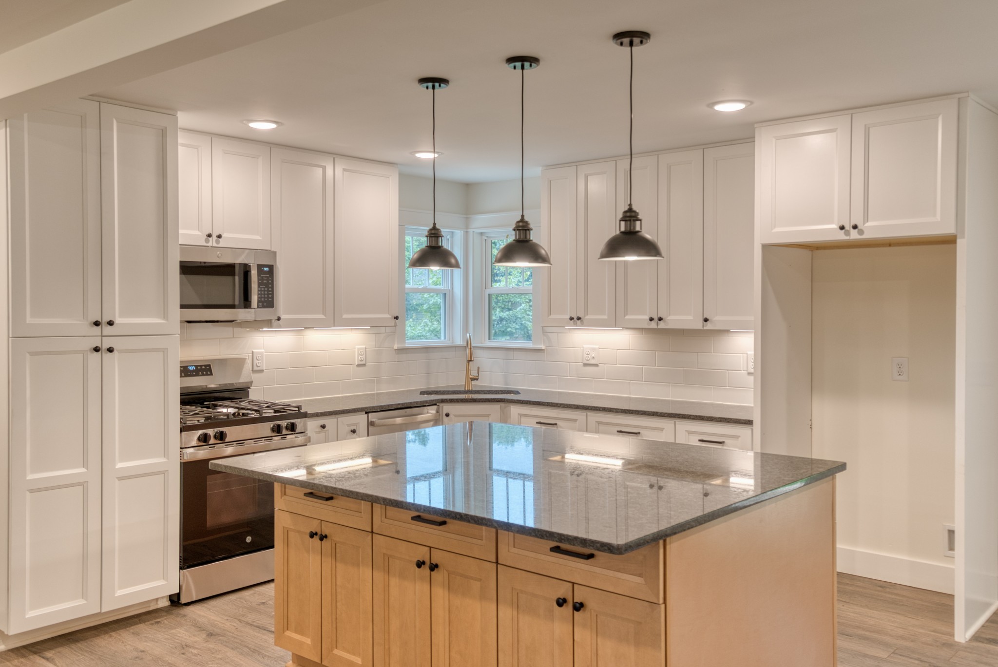 793 Spring Circle Springfield, TN 37172 - Photo 48 of 83 a kitchen with kitchen island a counter space stainless steel appliances and cabinets