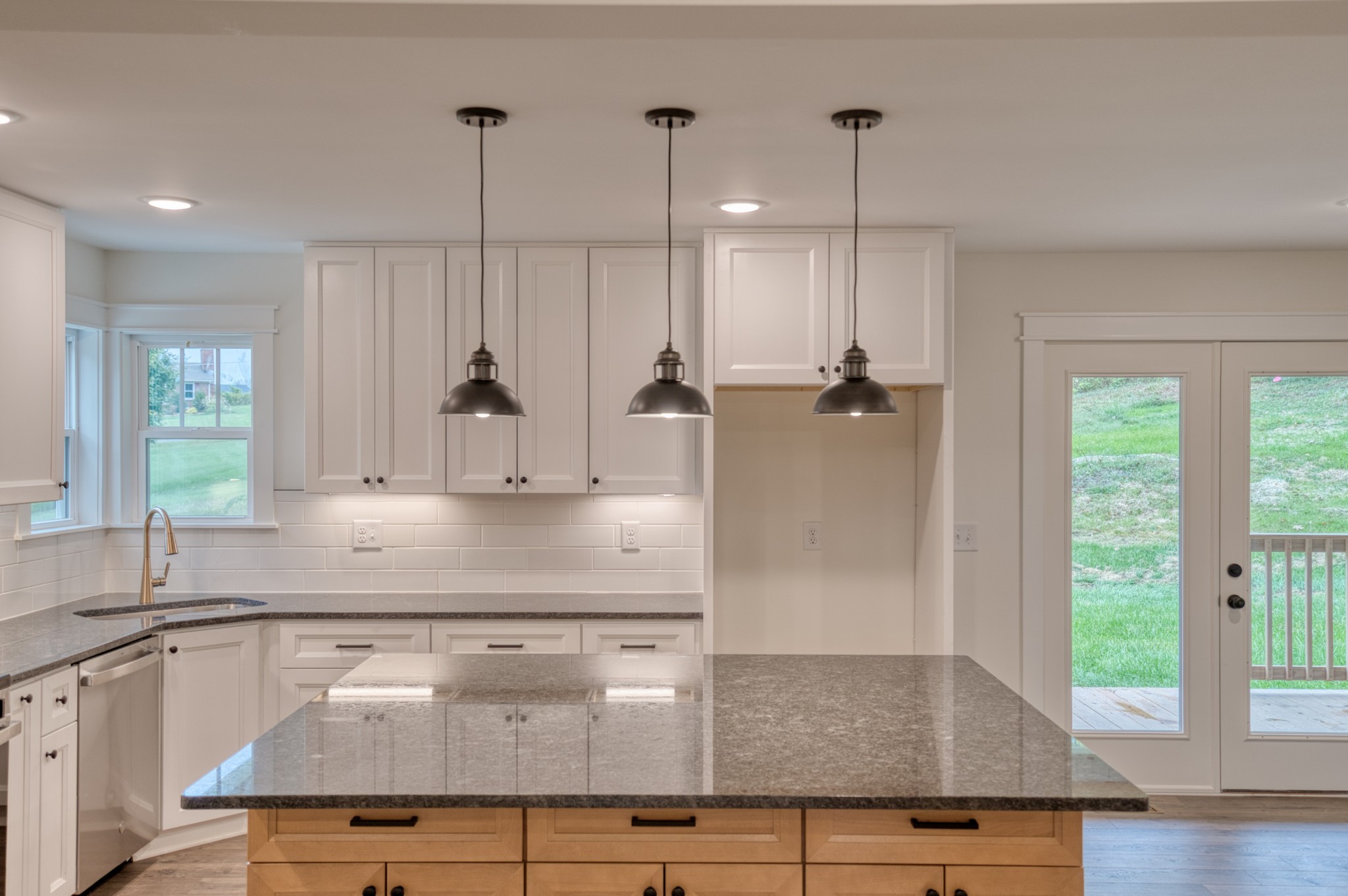 793 Spring Circle Springfield, TN 37172 - Photo 49 of 83 a kitchen with kitchen island a counter top space a sink appliances and a window