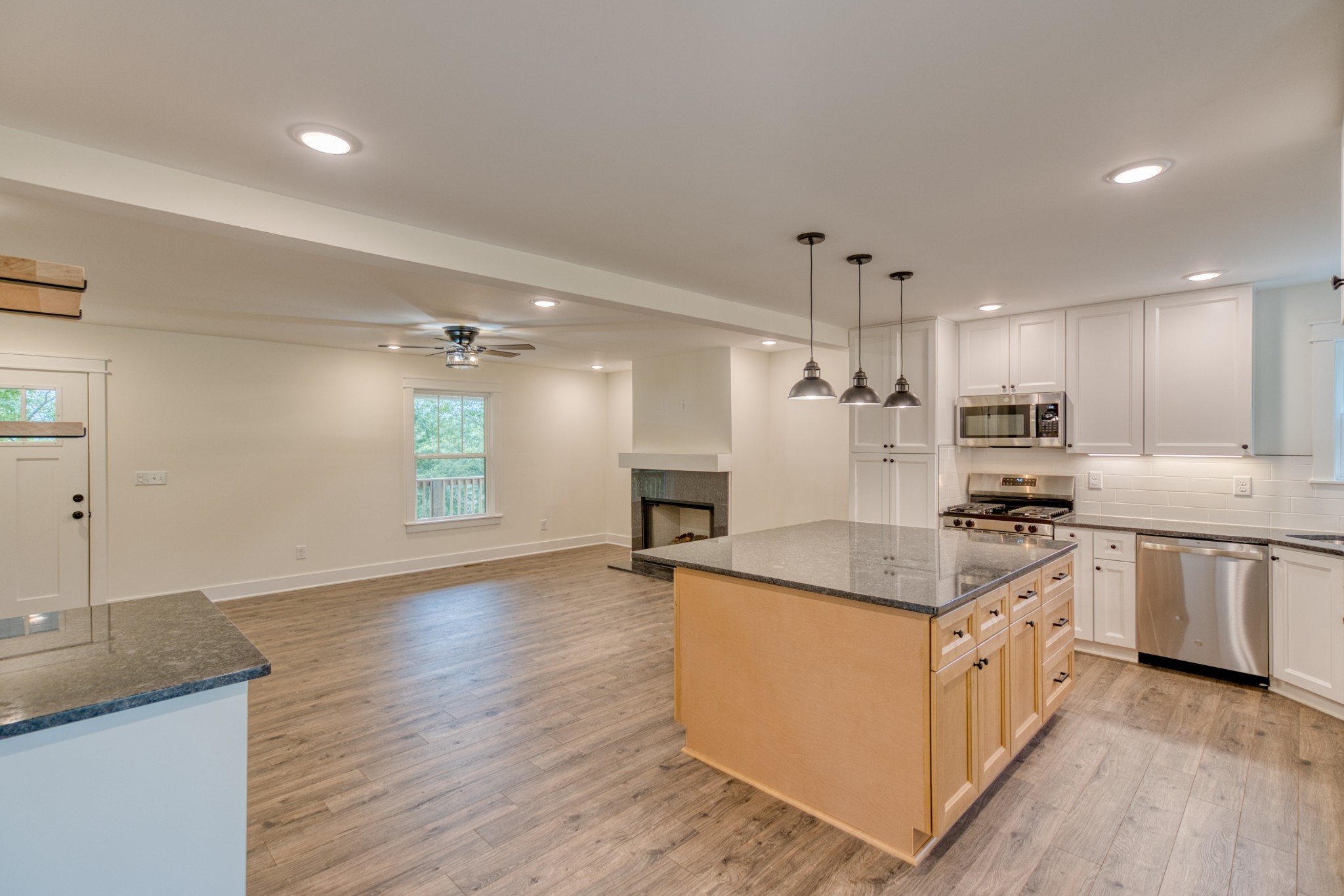 793 Spring Circle Springfield, TN 37172 - Photo 52 of 83 a kitchen with stainless steel appliances granite countertop a sink and stove