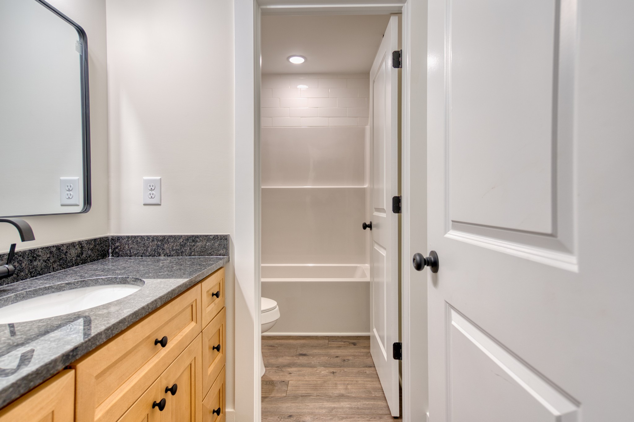 793 Spring Circle Springfield, TN 37172 - Photo 55 of 83 a bathroom with a granite countertop sink and a mirror