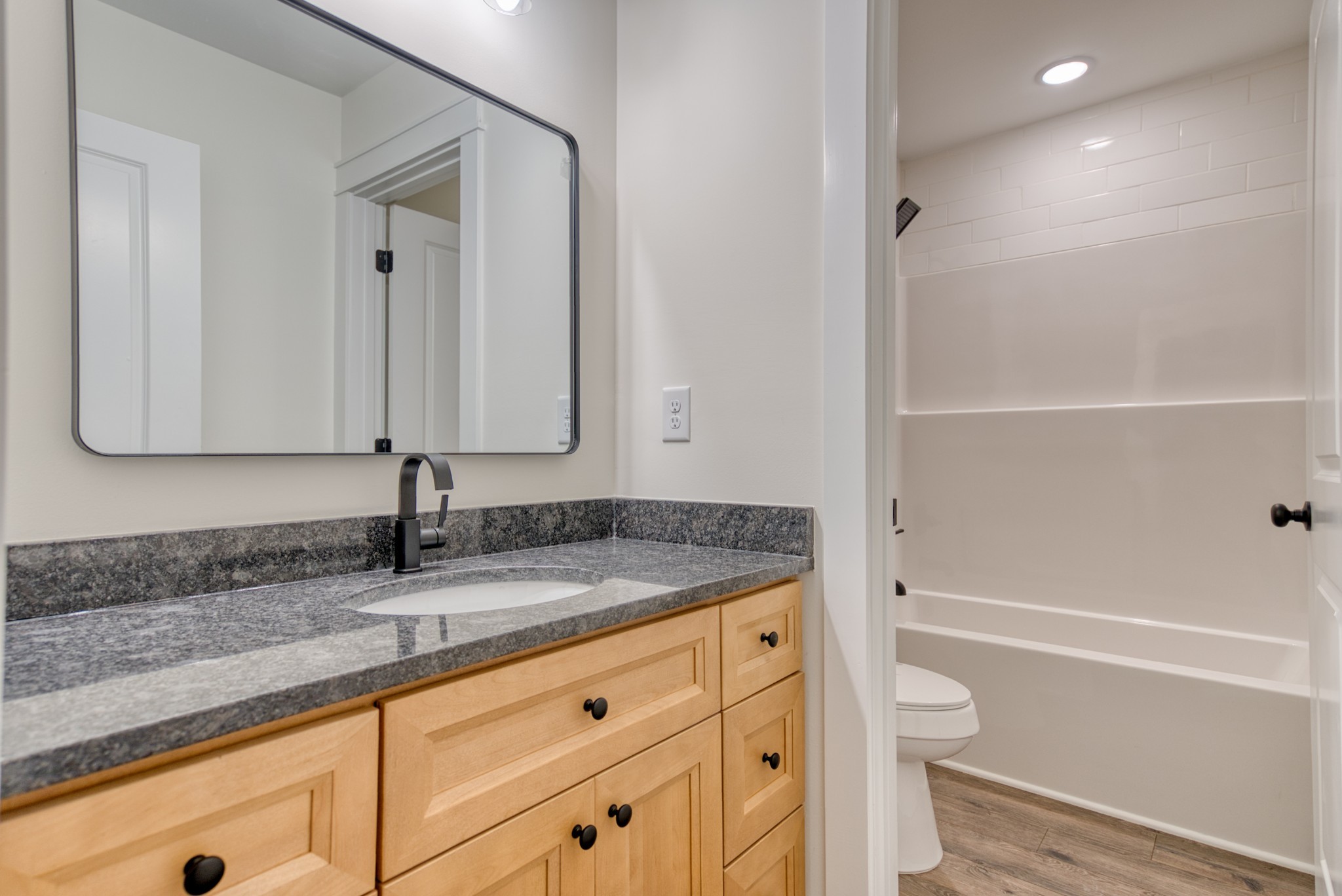 793 Spring Circle Springfield, TN 37172 - Photo 56 of 83 a bathroom with a granite countertop sink toilet and shower