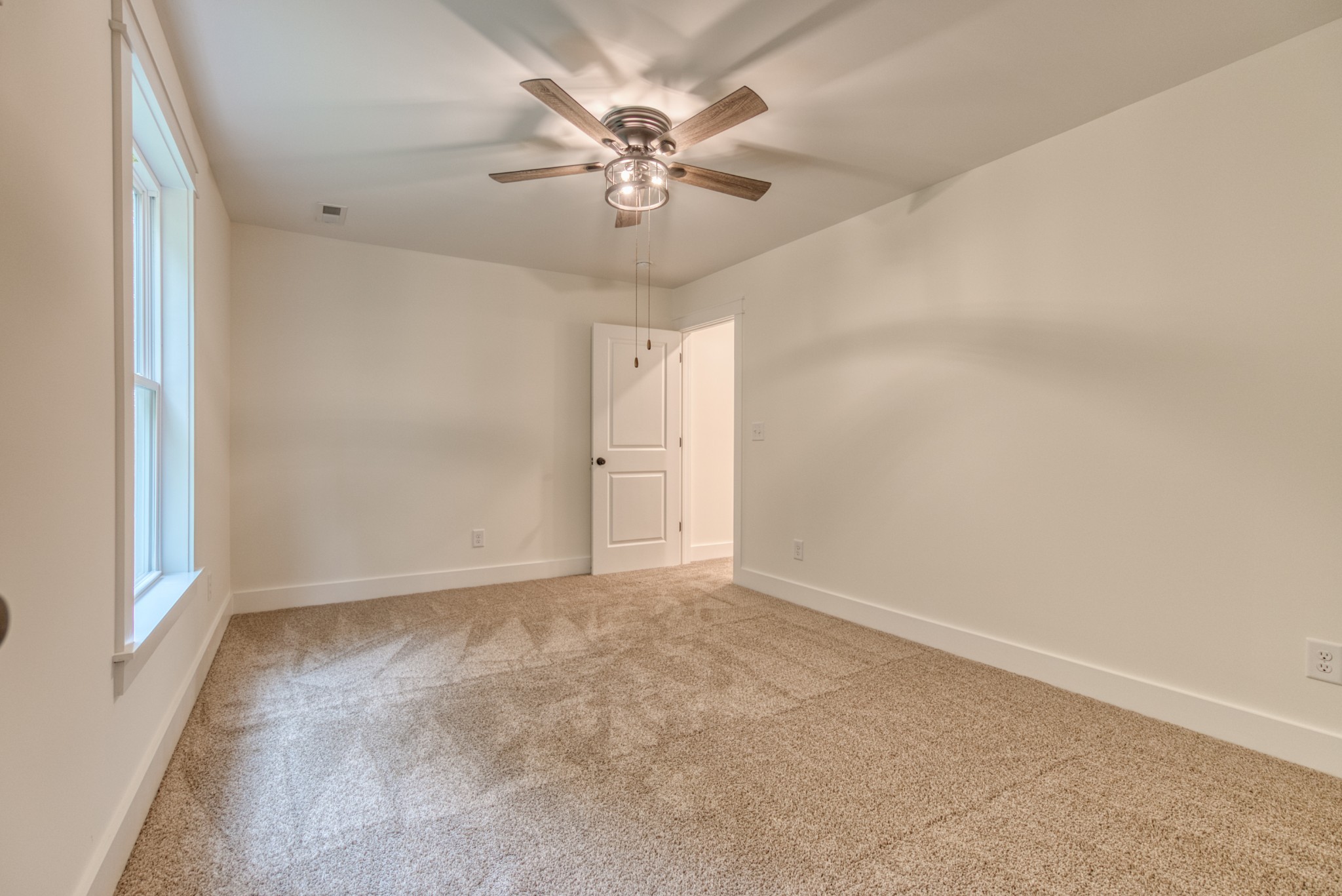 793 Spring Circle Springfield, TN 37172 - Photo 65 of 83 an empty room with windows and fan