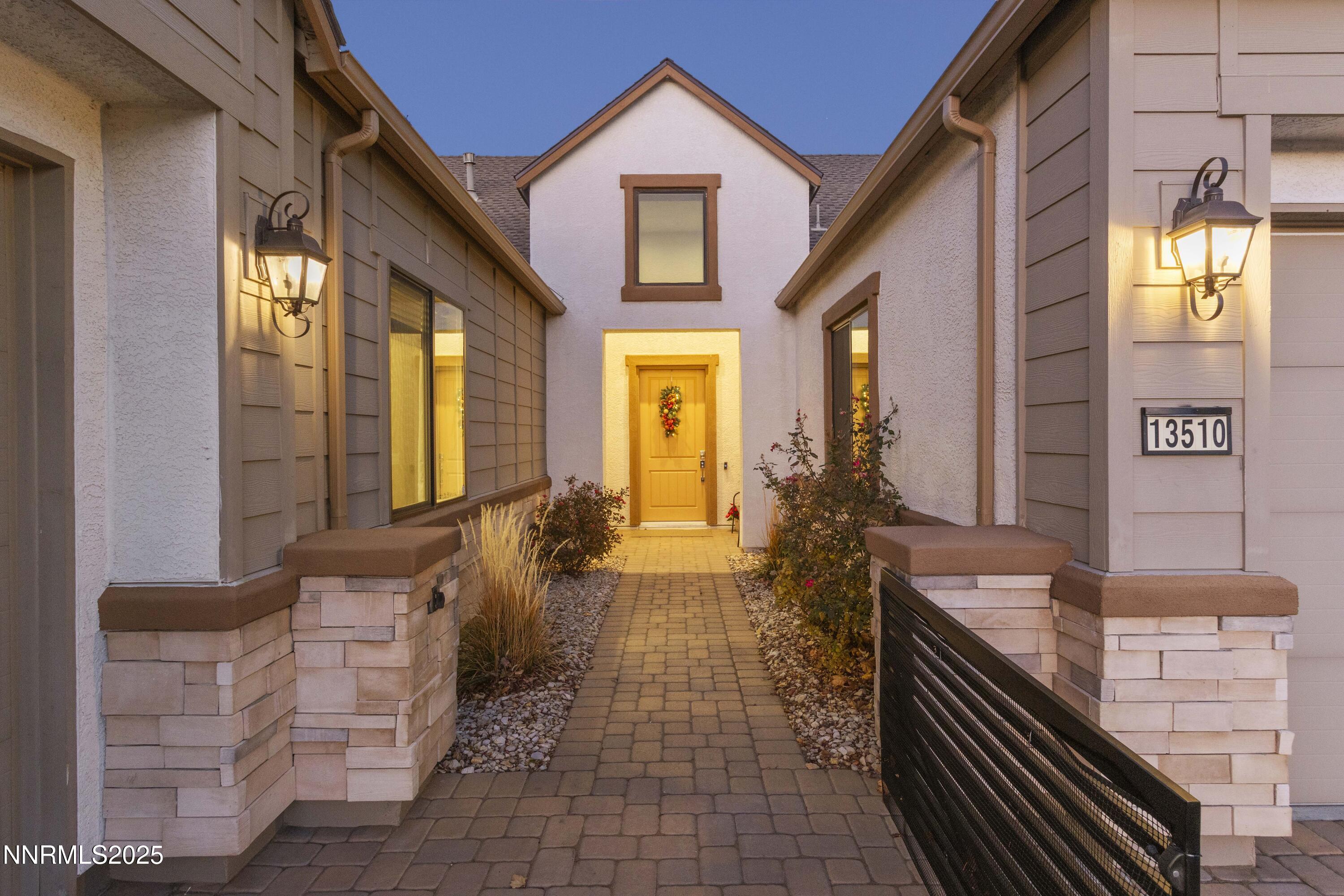 13510 Water Willow Street Reno, NV 89521 - Photo 2 of 56 13510 Water Willow Exterior Entry Dusk