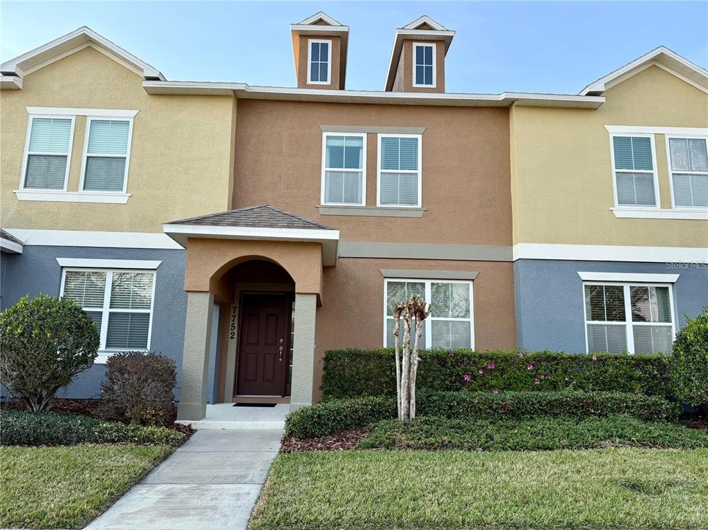 7752 Rigby Street Windermere, FL 34786 - Photo 1 of 1 a front view of a house with garden