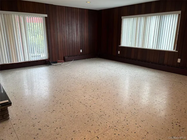 an empty room with windows