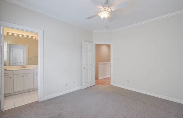 an empty room with a bathroom