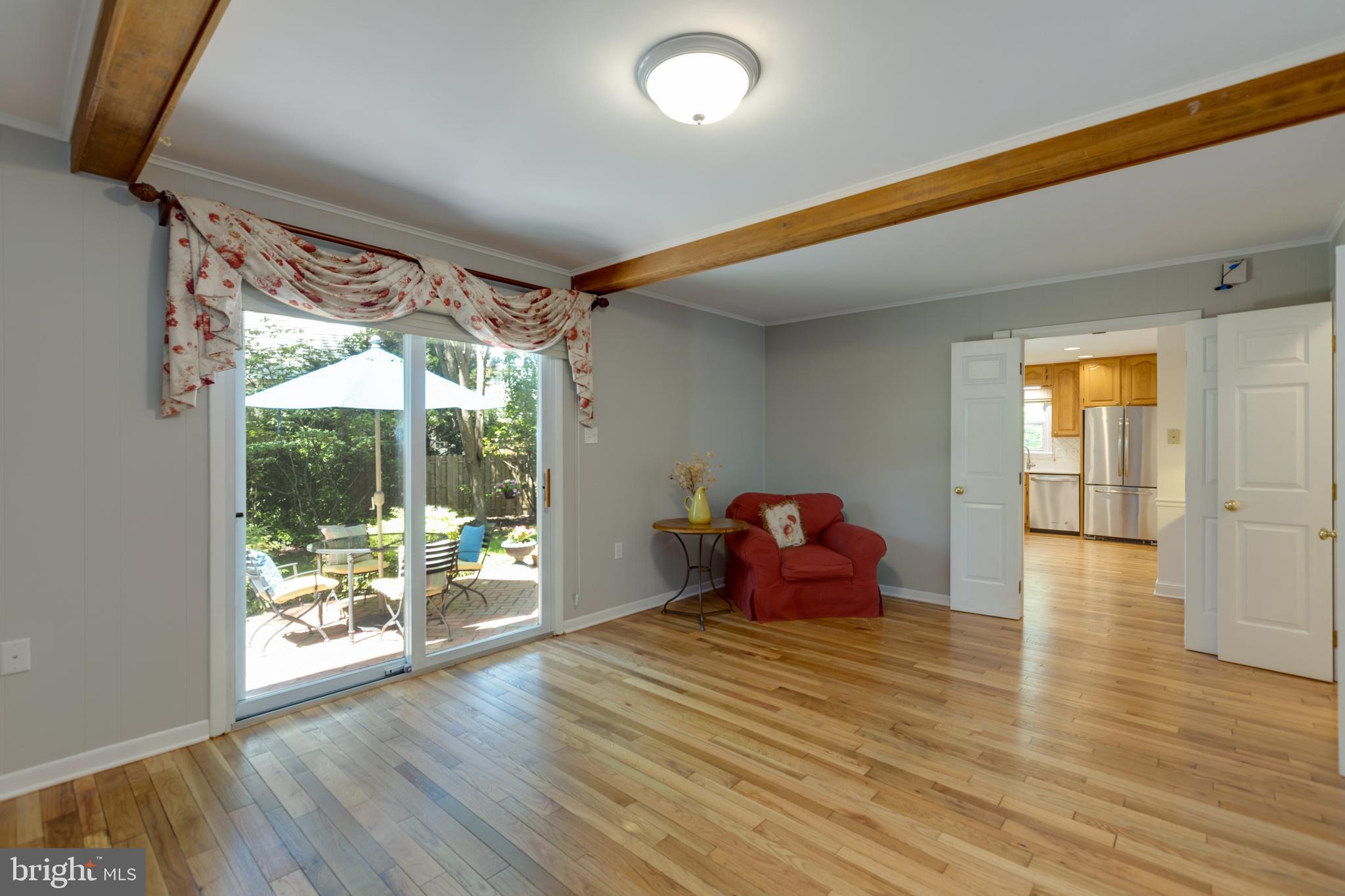 8238 Crown Court Road Alexandria, VA 22308 - Photo 24 of 57 Family room opens to paved patio and backyard
