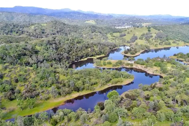 a view of a yard with a mountain