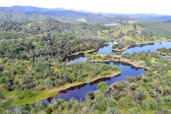 a view of a yard with a mountain