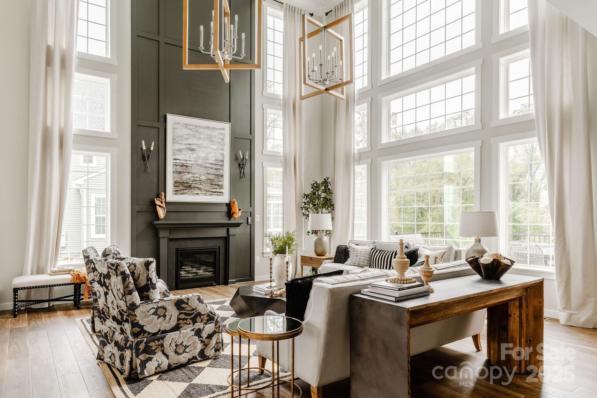 15 Huntersville-Concord Road, Unit DEVONSHIRE Huntersville, NC 28078 - Photo 25 of 48 a living room with furniture and large windows