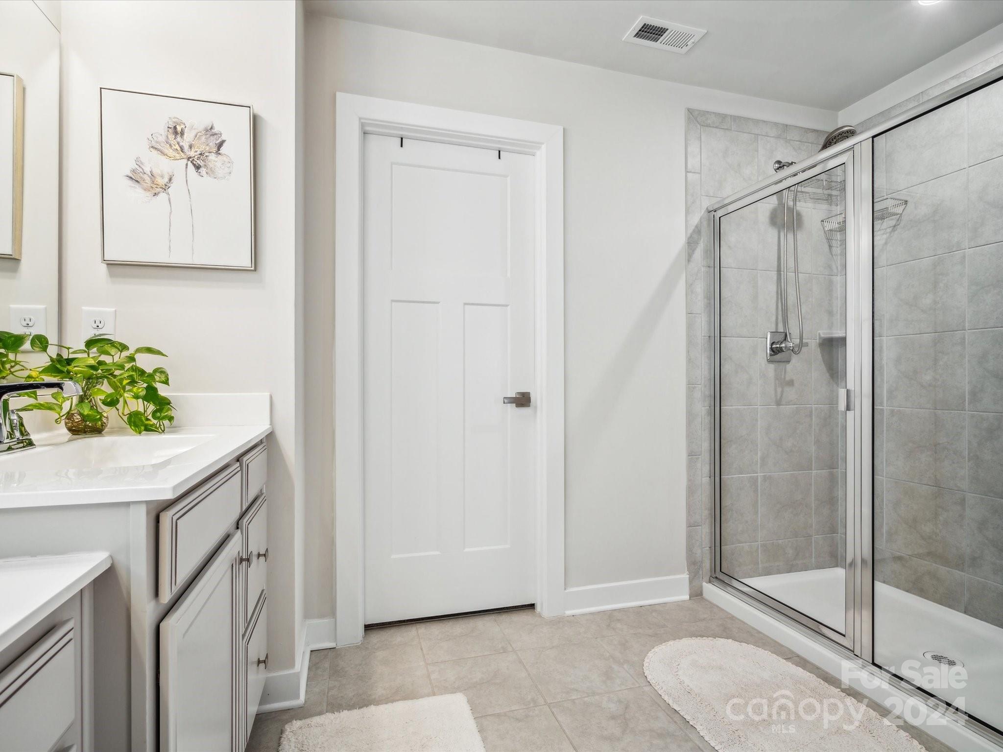 7114 Messina Road Indian Land, SC 29707 - Photo 33 of 40 a bathroom with a shower and a sink