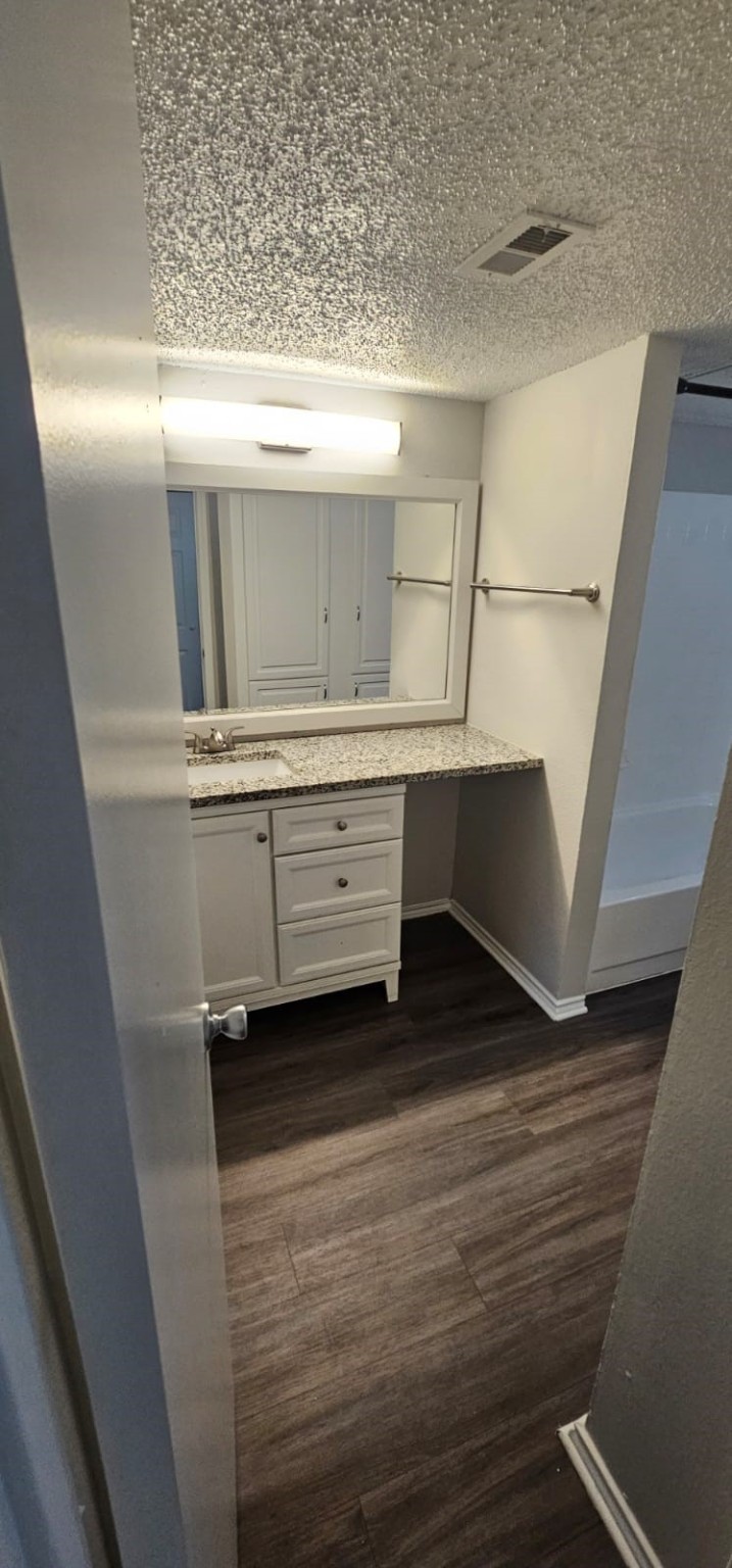 3737 Timberglen Road, Unit 1912 Dallas, TX 75287 - Photo 4 of 19 a room with storage and utility