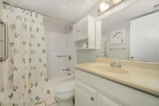 a bathroom with a toilet and a sink