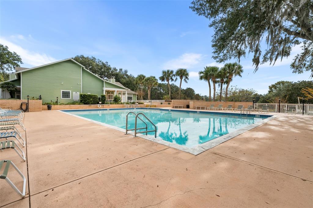 10510 Northwest 28th Place Gainesville, FL 32606 - Photo 39 of 40 a swimming pool with an outdoor seating