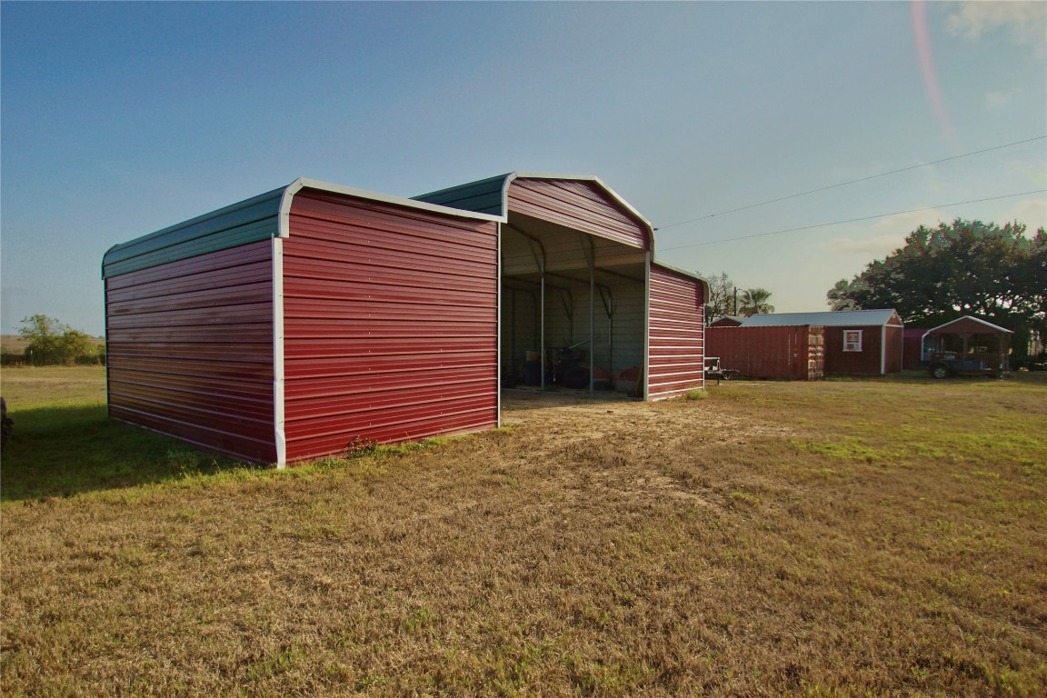 1891 Dworaczyk Road Yorktown, TX 78164 - Photo 17 of 48 a backyard of a house