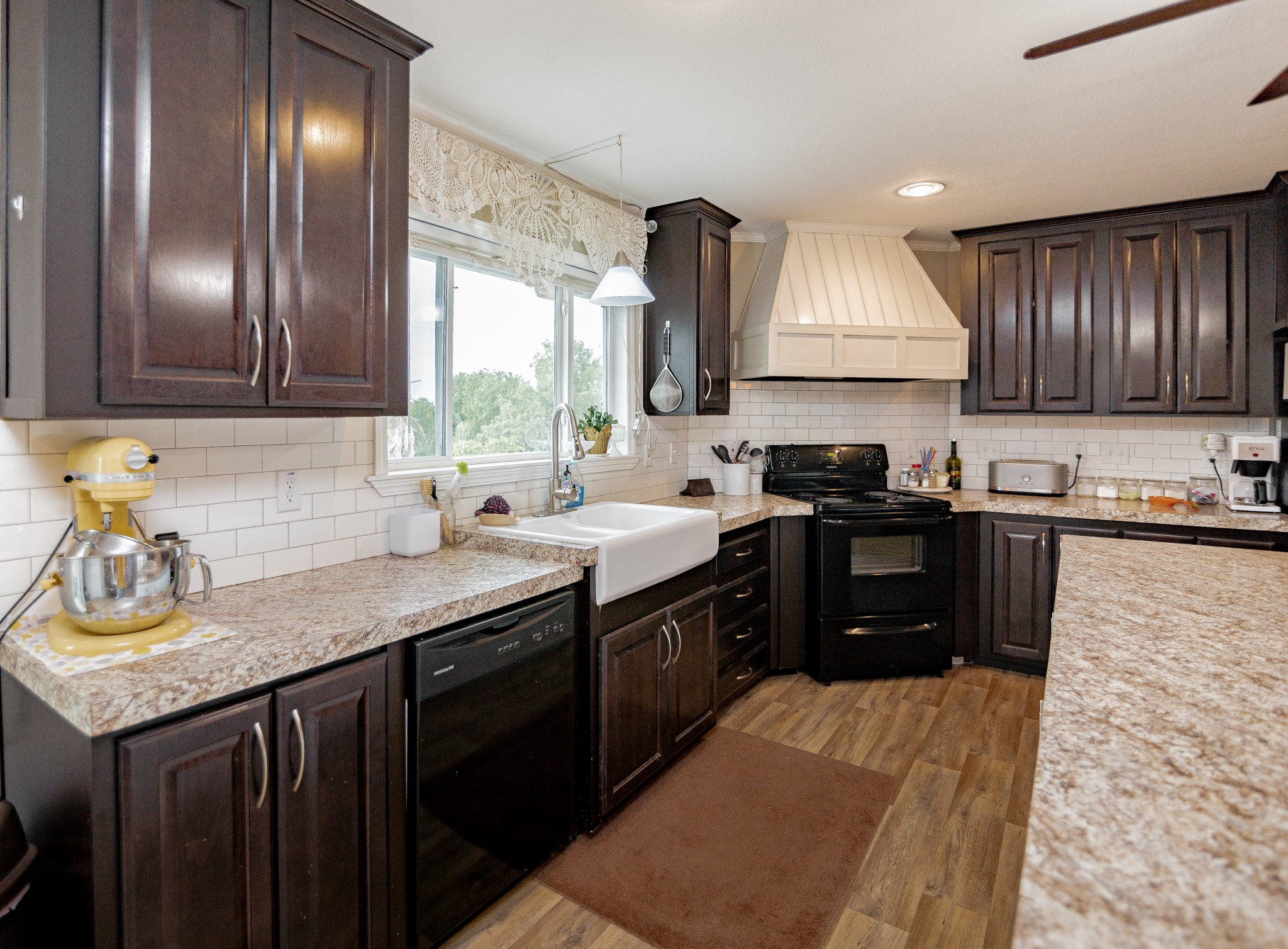 1891 Dworaczyk Road Yorktown, TX 78164 - Photo 31 of 48 a kitchen with a sink stove and cabinets