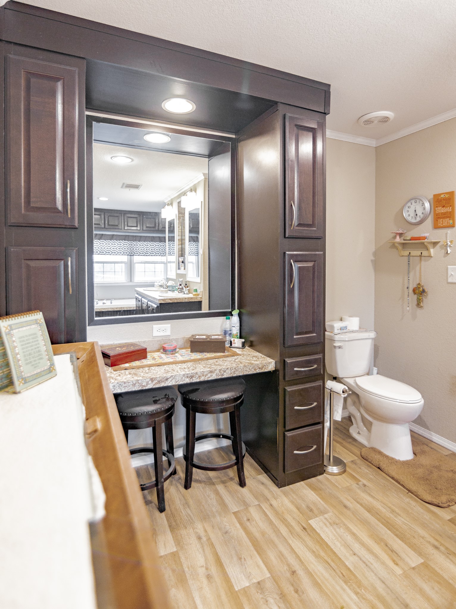 1891 Dworaczyk Road Yorktown, TX 78164 - Photo 39 of 48 a view of a bathroom with a sink a toilet and a mirror