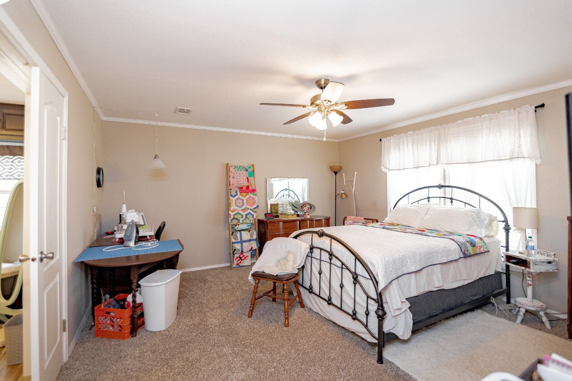 1891 Dworaczyk Road Yorktown, TX 78164 - Photo 41 of 48 a bedroom with a bed and a table in it