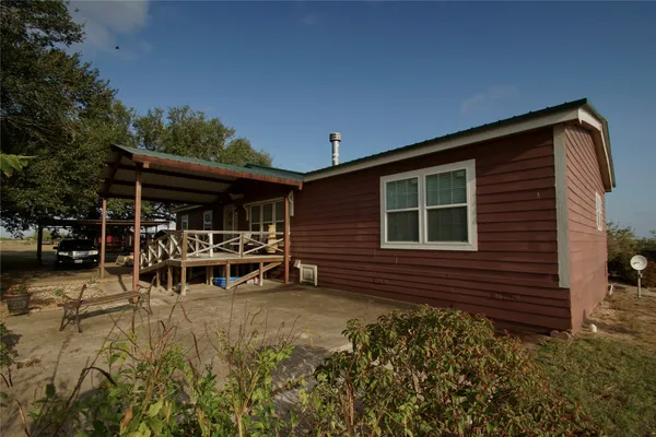 a view of a house with a patio