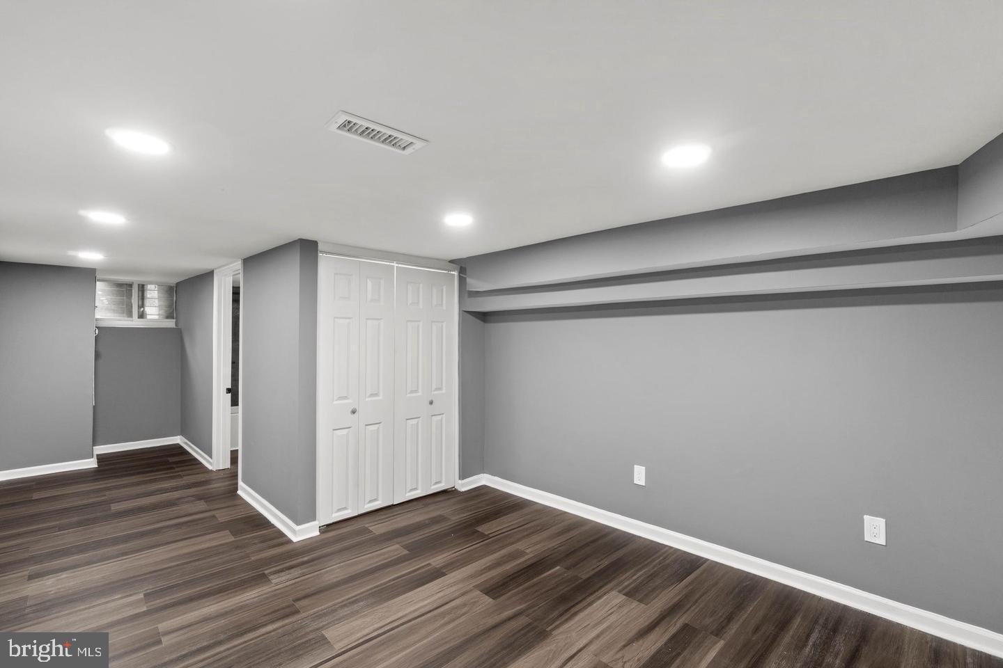 1524 Byrd Street Baltimore, MD 21230 - Photo 23 of 26 a view of an empty room with wooden floor