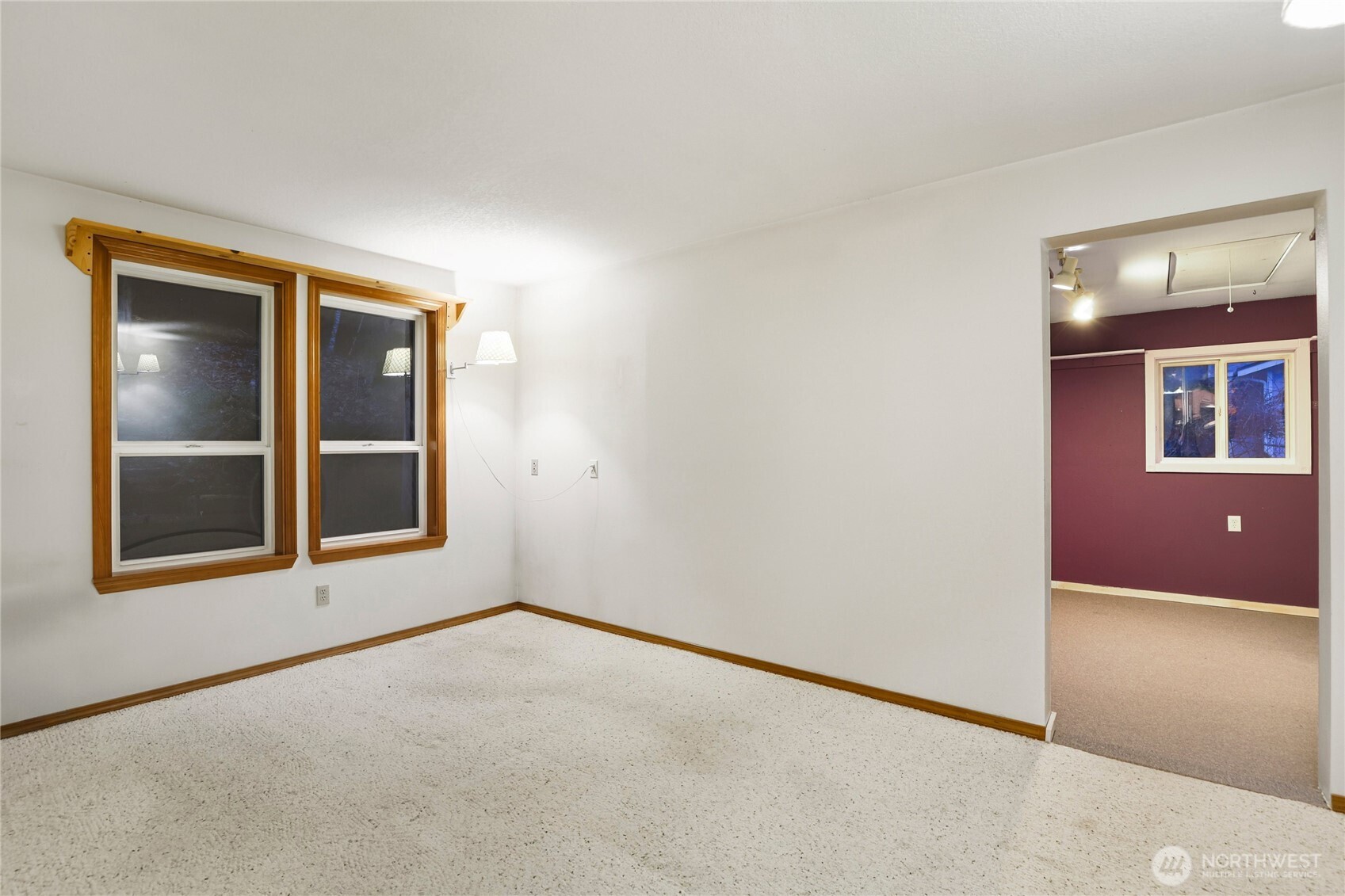 15121 Cedar Grove Road Northeast Poulsbo, WA 98370 - Photo 14 of 40 an empty room with windows and closet