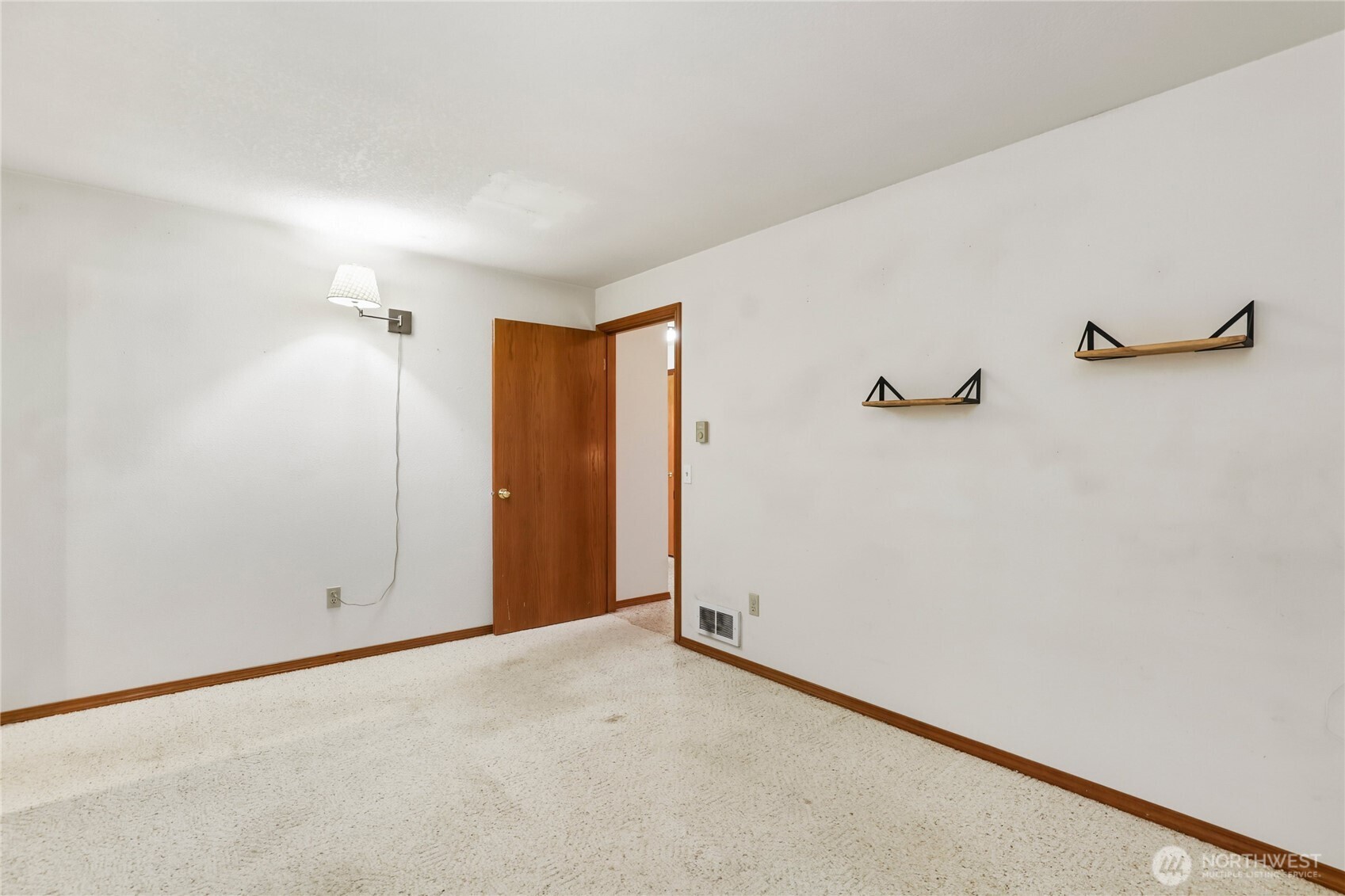 15121 Cedar Grove Road Northeast Poulsbo, WA 98370 - Photo 15 of 40 a view of an empty room