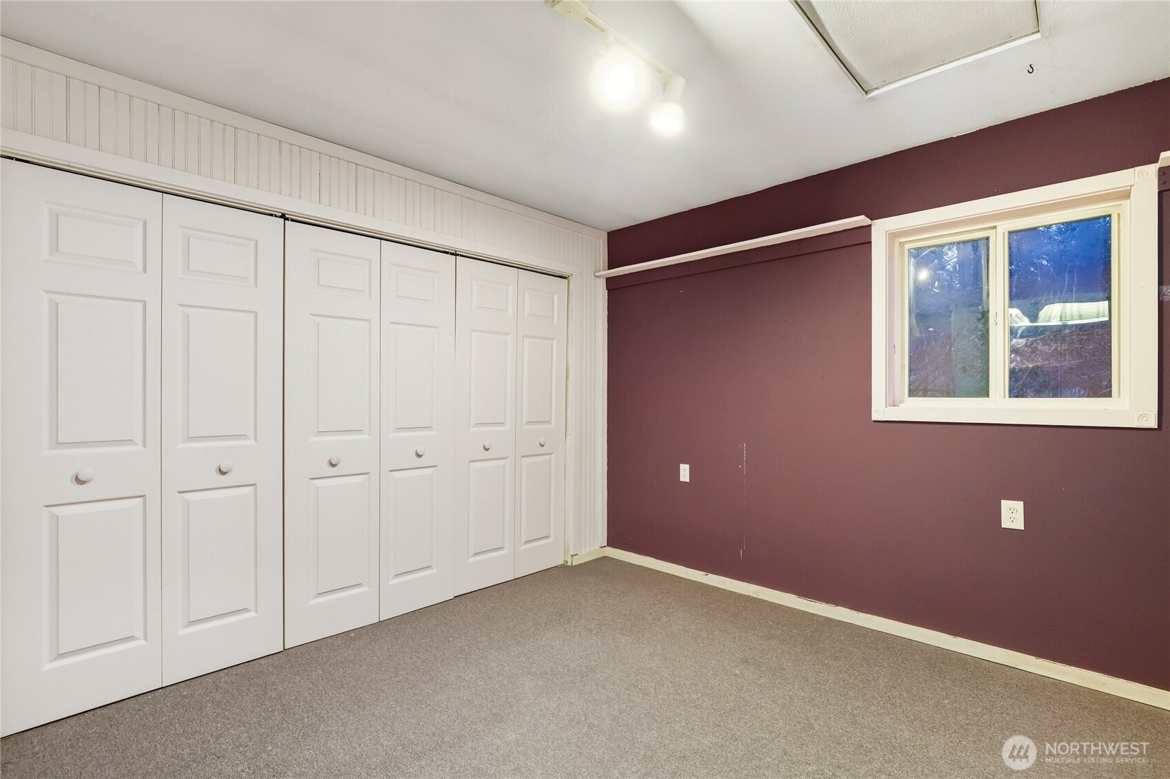 15121 Cedar Grove Road Northeast Poulsbo, WA 98370 - Photo 16 of 40 a view of an empty room