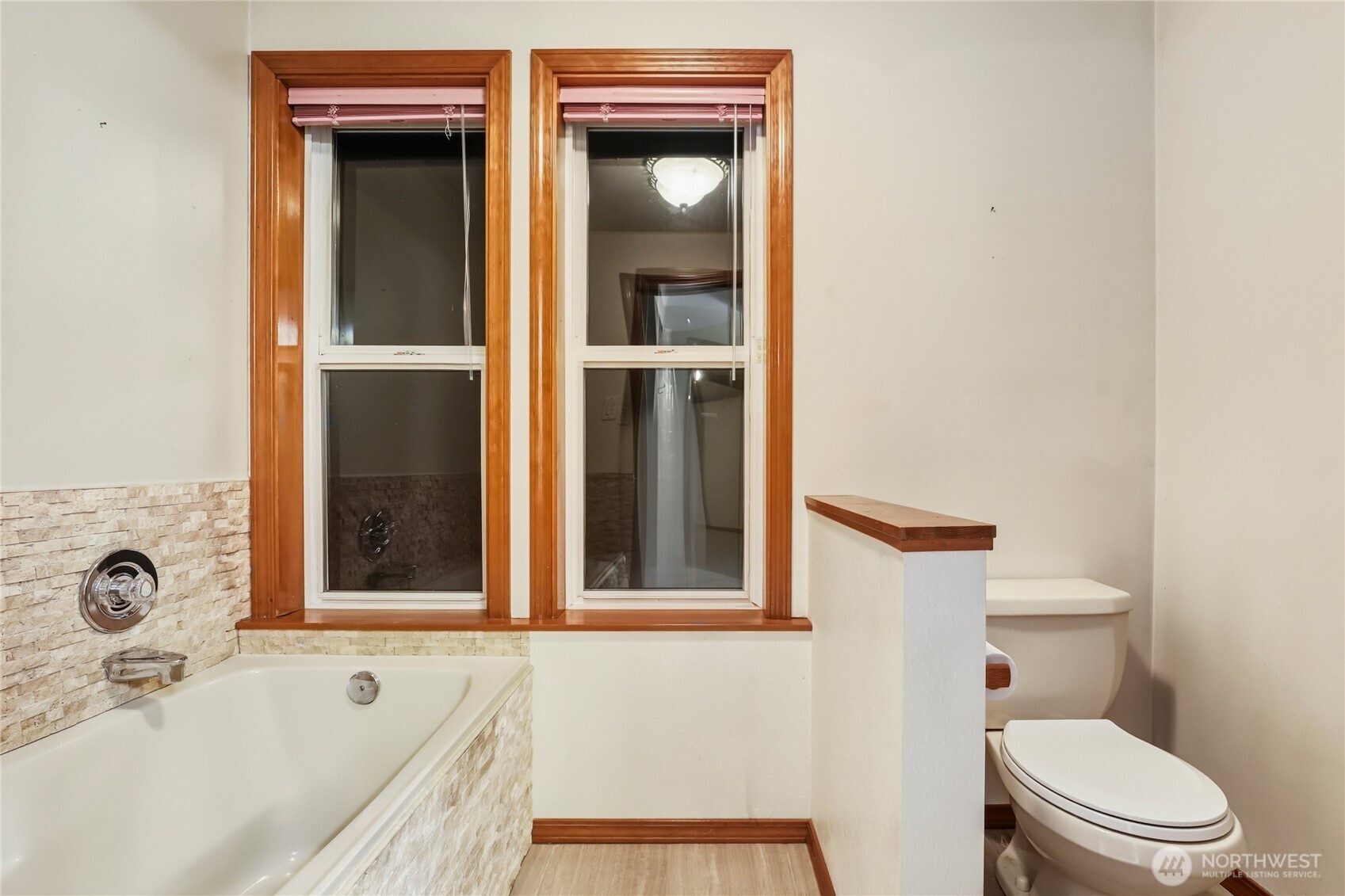 15121 Cedar Grove Road Northeast Poulsbo, WA 98370 - Photo 24 of 40 a bathroom with a granite countertop sink and a toilet