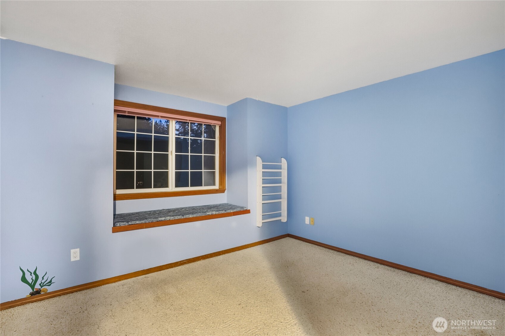 15121 Cedar Grove Road Northeast Poulsbo, WA 98370 - Photo 26 of 40 an empty room with windows