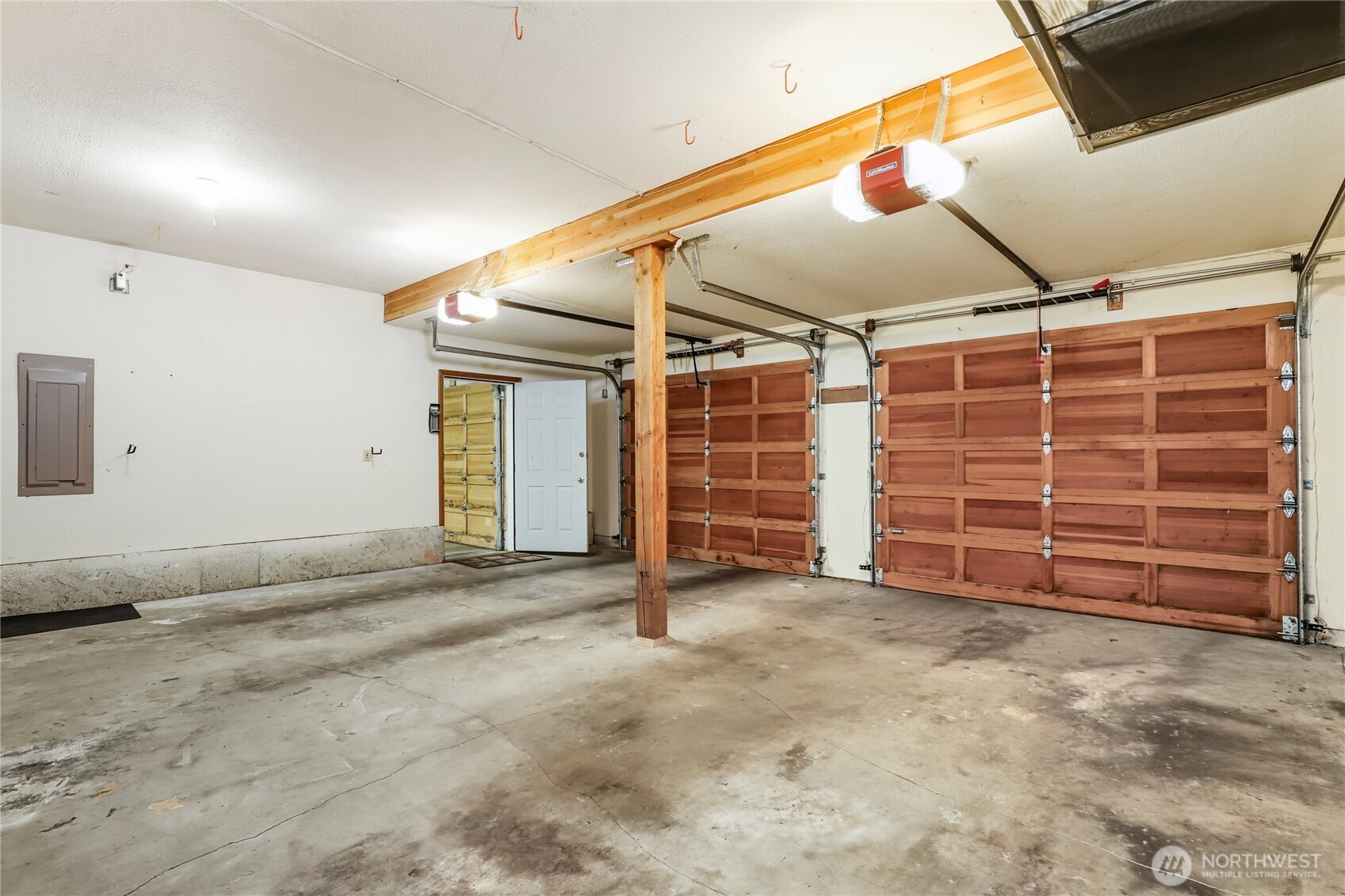 15121 Cedar Grove Road Northeast Poulsbo, WA 98370 - Photo 31 of 40 a view of room with garage