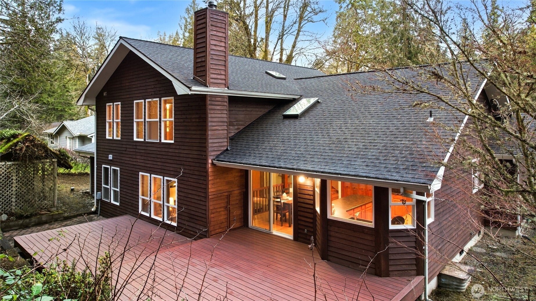 15121 Cedar Grove Road Northeast Poulsbo, WA 98370 - Photo 35 of 40 a backyard of a house with seating space