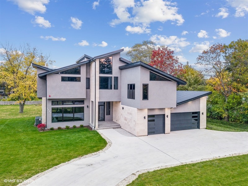 1341 Pfingsten Road Northbrook, IL 60062 - Photo 39 of 58 a view of a house with a yard