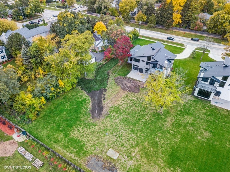 1341 Pfingsten Road Northbrook, IL 60062 - Photo 43 of 58 an aerial view of a house with a garden and swimming pool