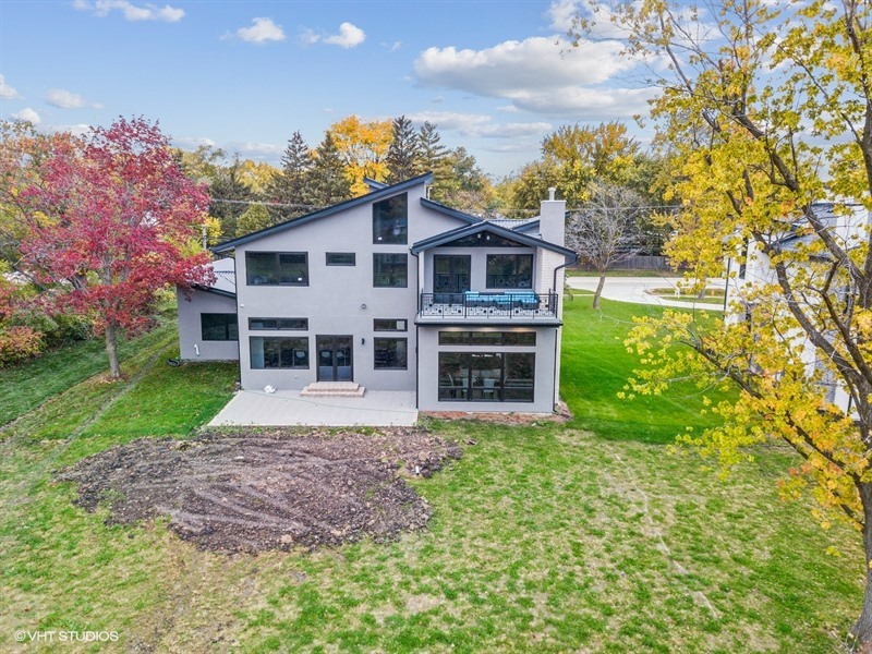 1341 Pfingsten Road Northbrook, IL 60062 - Photo 45 of 58 a view of a house with yard and a garden