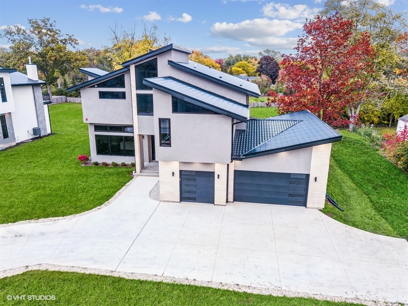 1341 Pfingsten Road Northbrook, IL 60062 - Photo 49 of 58 a house that has a tree in front of the house