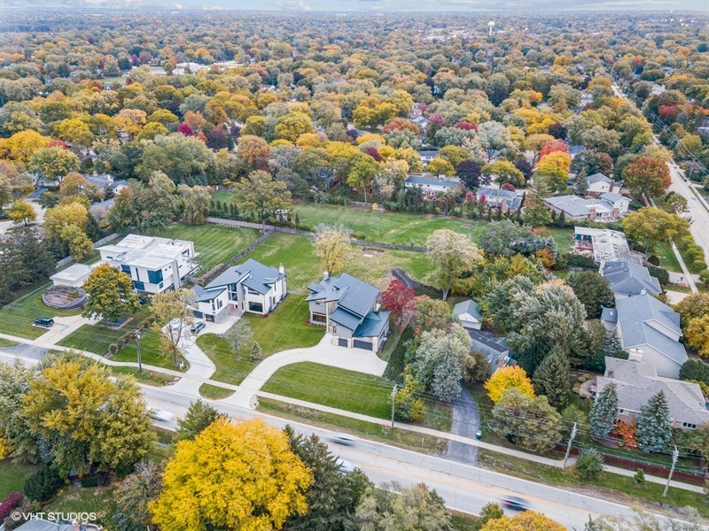 1341 Pfingsten Road Northbrook, IL 60062 - Photo 54 of 58 an aerial view of a house with a lake view
