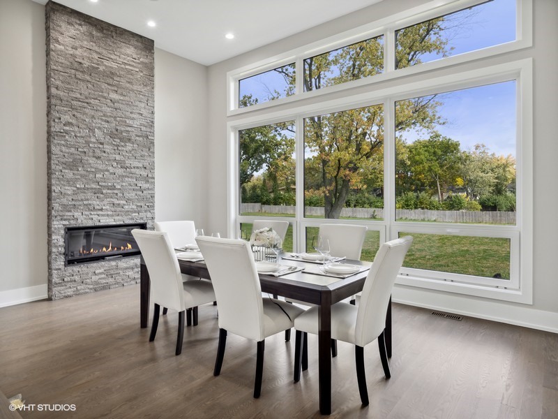 1341 Pfingsten Road Northbrook, IL 60062 - Photo 7 of 58 a view of a dining room with furniture window and outside view