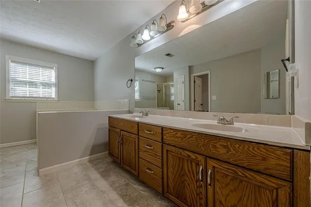 $475,000 | 5055 Puritan Drive, Sugar Hill, GA 30518